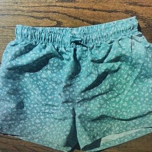 Kids Swim Trunks in Teal Floral Pattern